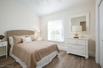 22199 Seashore Cir in Estero, FL - Building Photo - Building Photo
