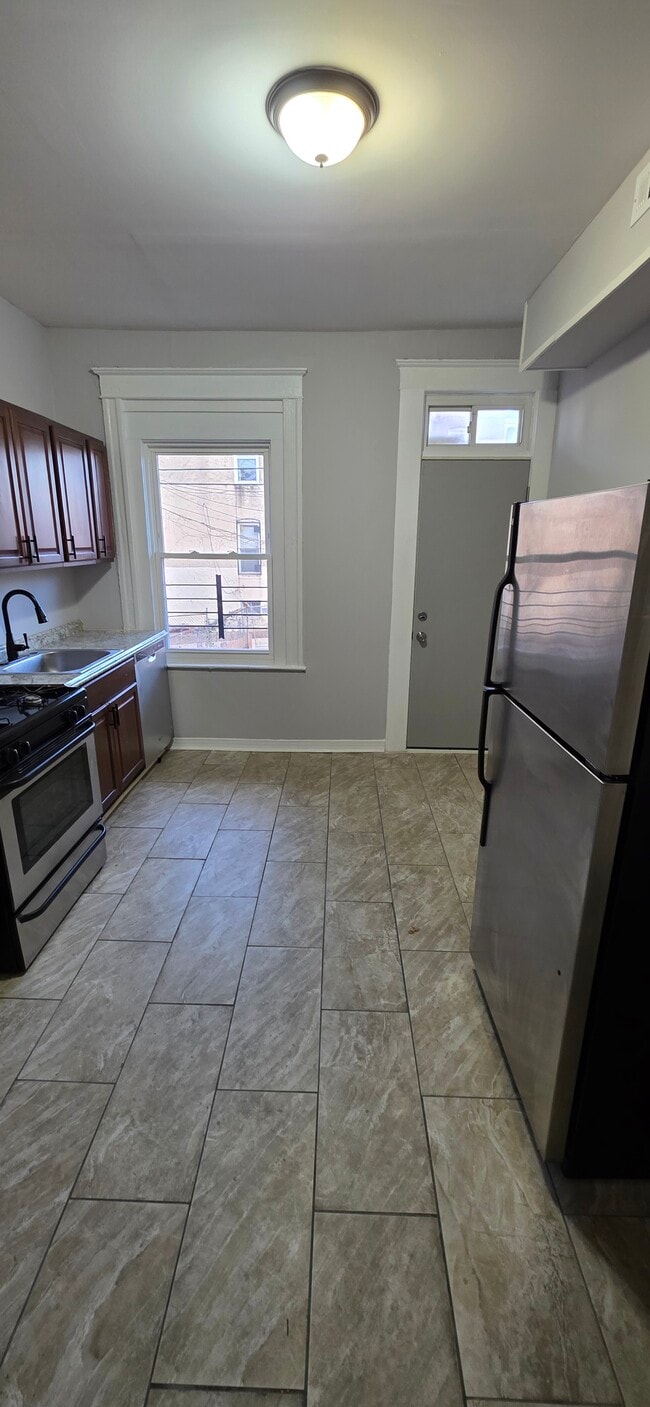 1135 Poplar Grove St in Baltimore, MD - Building Photo - Building Photo