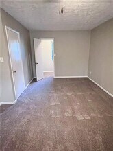 2936 Spanish Oak Dr SW in Lilburn, GA - Building Photo - Building Photo