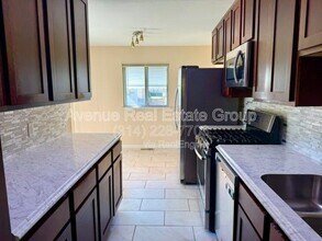 11090 Alan Shepard Dr in Maryland Heights, MO - Building Photo - Building Photo