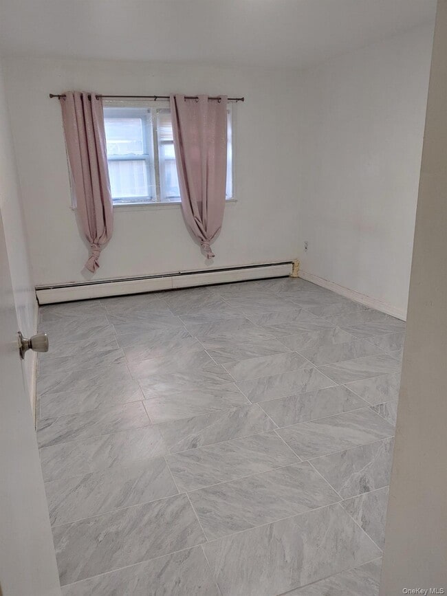 property at 88-29 Pontiac St