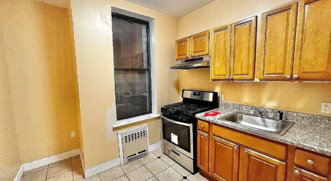 424 E 138th St in Bronx, NY - Foto de edificio - Building Photo