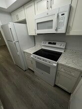 1350 E Sample Rd, Unit 110 in Pompano Beach, FL - Foto de edificio - Building Photo