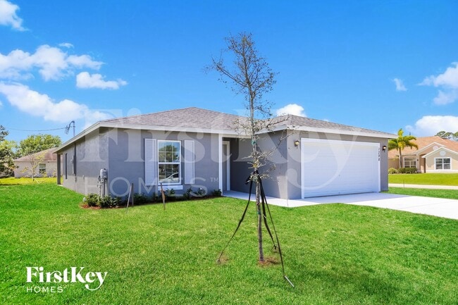 1298 SW Crost Ave in Port St. Lucie, FL - Foto de edificio - Building Photo