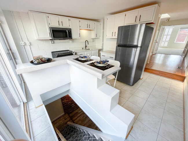 1135 Olive St in Baltimore, MD - Building Photo - Building Photo