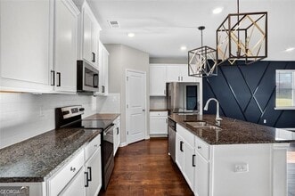 1553 Spring Hollow Way in Stone Mountain, GA - Building Photo - Building Photo