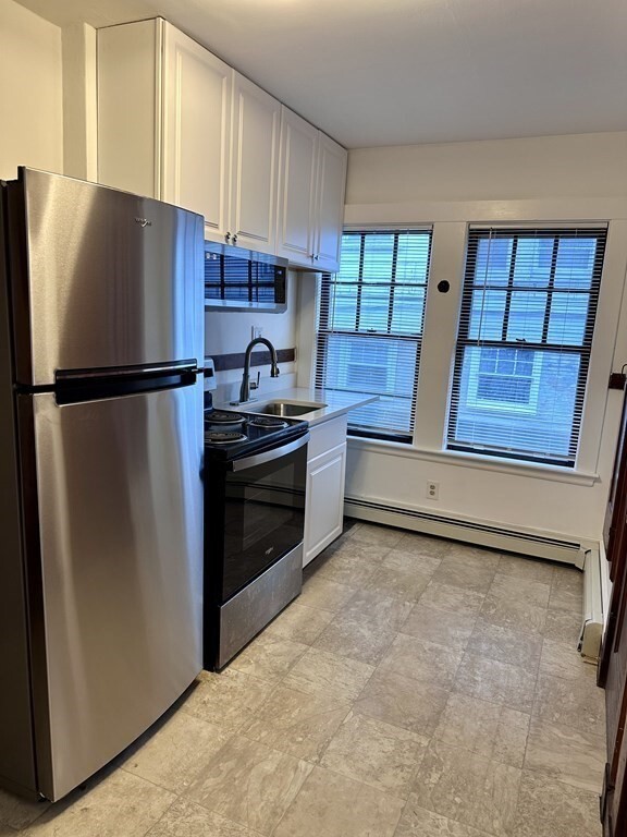 289 Highland Ave, Unit 1L in Quincy, MA - Foto de edificio - Building Photo