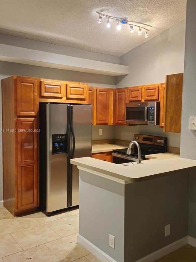 701 Lyons Rd in Coconut Creek, FL - Building Photo - Building Photo