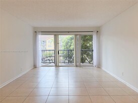 9055 Wiles Rd in Coral Springs, FL - Building Photo