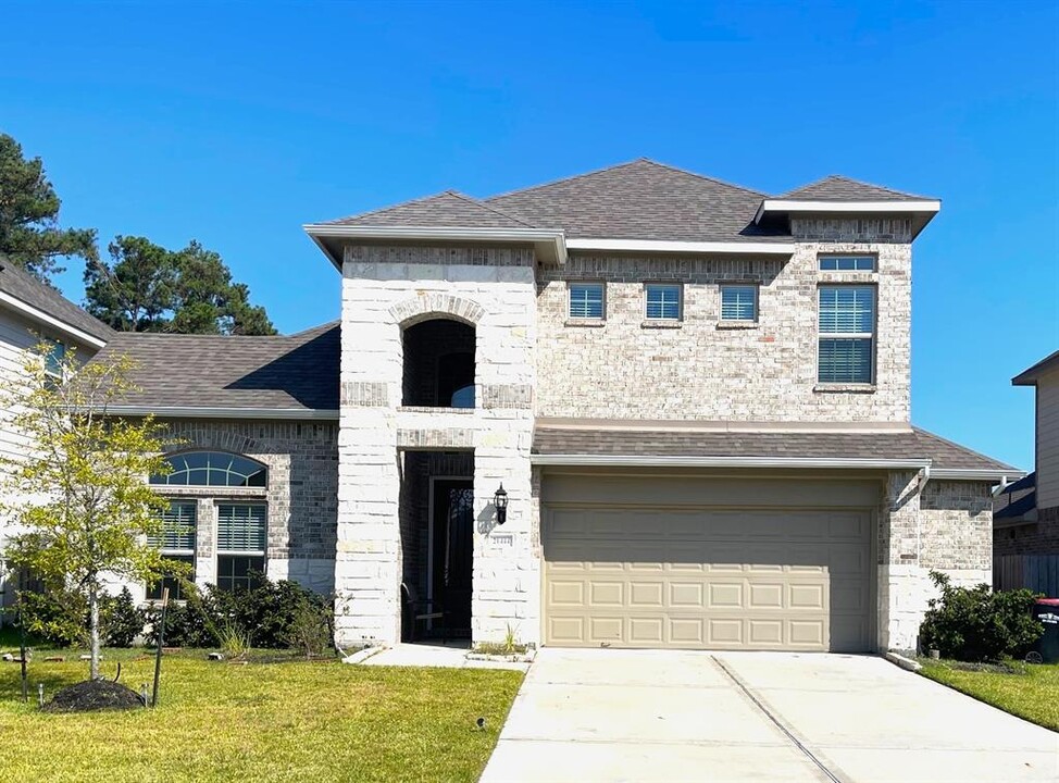 21444 Kings Guild Ln in Kingwood, TX - Foto de edificio