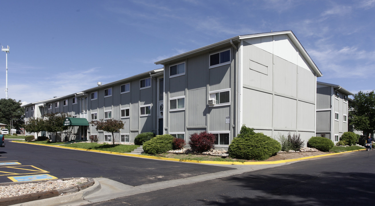 Pine Gardens Apartments in Federal Heights, CO - Building Photo