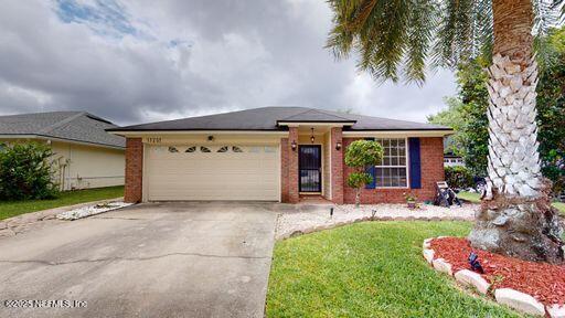 11201 Wandering Oaks Dr in Jacksonville, FL - Building Photo