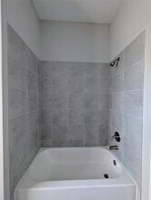 7486 Woo St in Pearland, TX - Foto de edificio - Building Photo