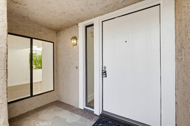 23117 Kimmore Terrace, Unit 207 in Santa Clarita, CA - Building Photo - Building Photo