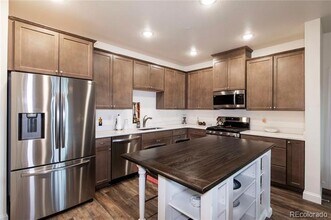 9962 W Victoria Pl in Littleton, CO - Building Photo - Building Photo