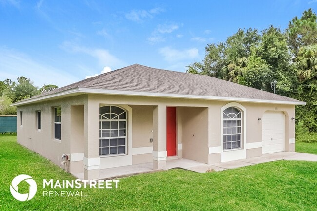 1016 Bagget St E in Lehigh Acres, FL - Building Photo - Building Photo