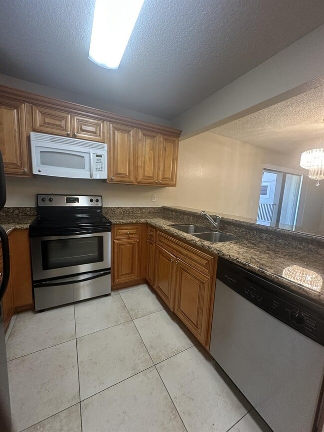1561 Windorah Way, Unit H in West Palm Beach, FL - Building Photo - Building Photo