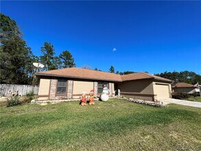 1211 W Newbury St in Citrus Springs, FL - Building Photo - Building Photo