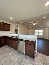 414 Wood Creek St in Lowell, AR - Foto de edificio - Building Photo