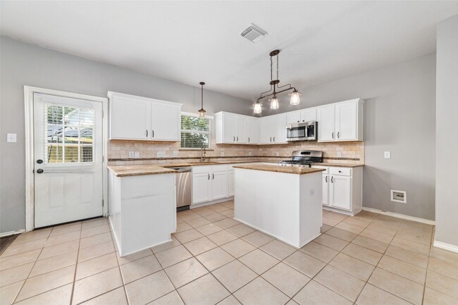 9823 Lynette Falls Dr