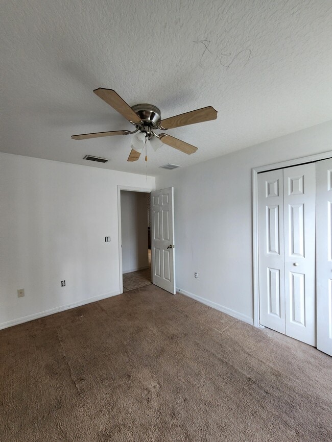 1007 Deddington Pl in Kissimmee, FL - Foto de edificio - Building Photo