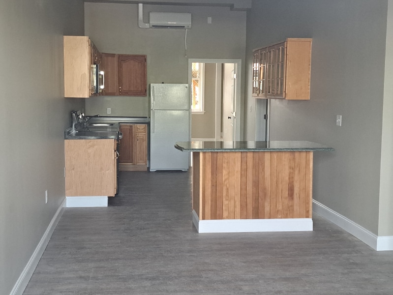 8 Depot St, Unit Unit 2 in Pittsfield, NH - Building Photo