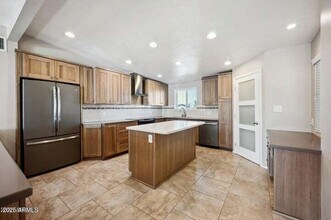 10731 W Abbott Ave in Sun City, AZ - Building Photo - Building Photo