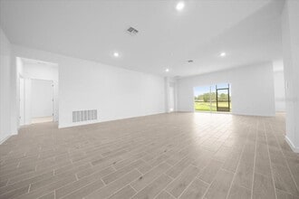 8885 SW 68th Ter Rd in Liberty Triangle, FL - Building Photo - Building Photo