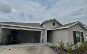 1100 Sand Trap Ct in Daytona Beach, FL - Building Photo