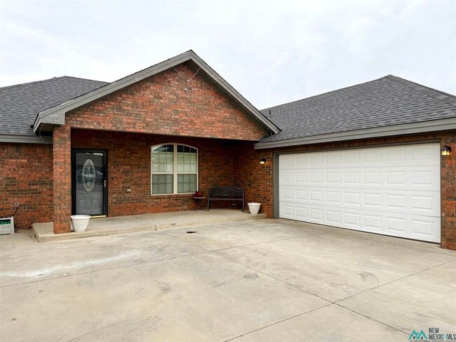 1347 Oakwood Cir in Portales, NM - Building Photo - Building Photo