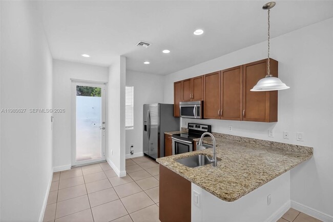 7657 NW 88th Terrace in Tamarac, FL - Building Photo - Building Photo