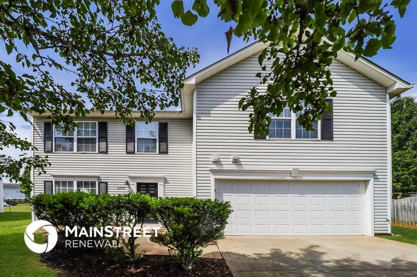 5203 Weeping Cherry Dr in Browns Summit, NC - Building Photo
