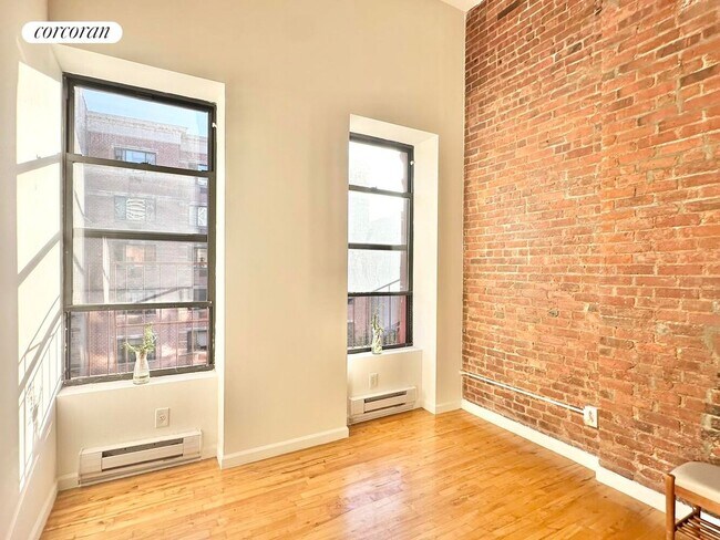 215 E 118th St in New York, NY - Building Photo - Building Photo