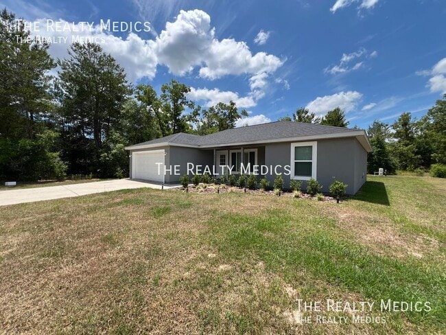 461 Malauka Loop in Ocklawaha, FL - Building Photo - Building Photo