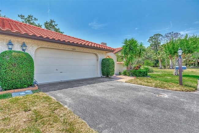 5651 Golf Pointe Dr in Sarasota, FL - Building Photo - Building Photo