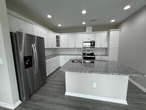 9022 Parrot Pl in Panama City Beach, FL - Building Photo - Building Photo