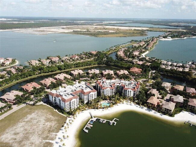 10050 Valiant Ct-Unit -201 in Miromar Lakes, FL - Building Photo - Building Photo