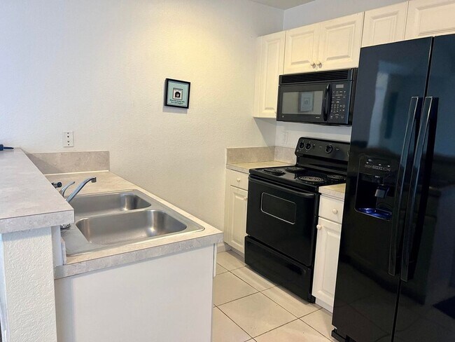 1989 Marsh Harbor Dr in Riviera Beach, FL - Building Photo - Building Photo