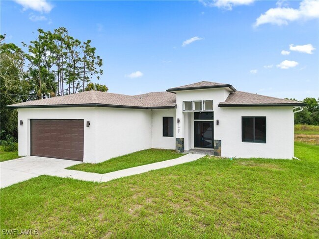 1902 Christopher Ave N in Lehigh Acres, FL - Building Photo - Building Photo
