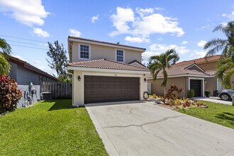 7842 Springfield Lake Dr in Greenacres, FL - Building Photo - Building Photo