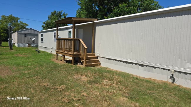 property at 906 FM247