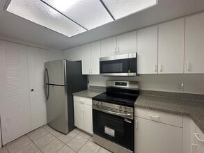 5001 Wiles Rd in Coconut Creek, FL - Building Photo - Building Photo