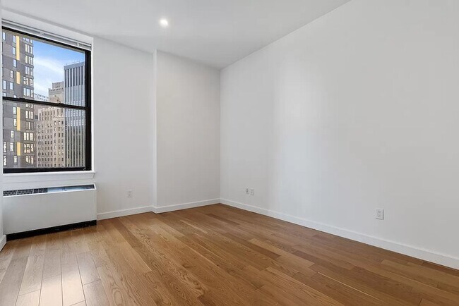 15 Broad St in New York, NY - Building Photo - Building Photo
