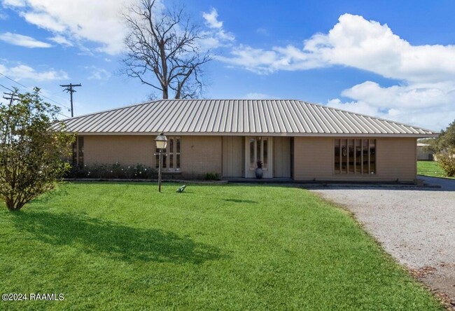 property at 616 E Broussard Rd
