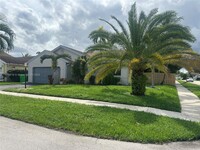 1297 SW 151st Ave in Sunrise, FL - Foto de edificio - Building Photo