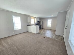 107 Beech in Highland, MI - Building Photo - Building Photo