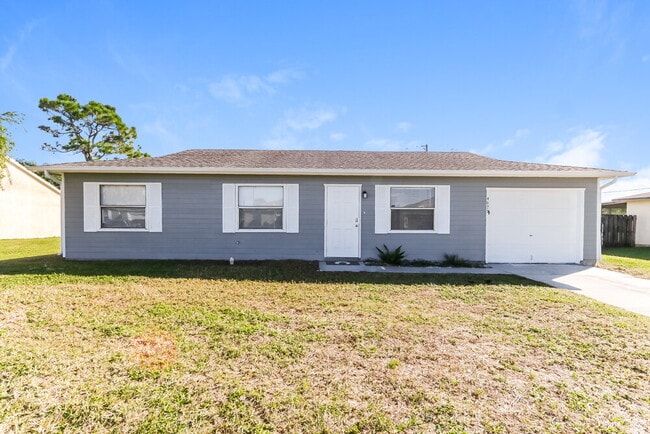 property at 4673 SW Monaco St