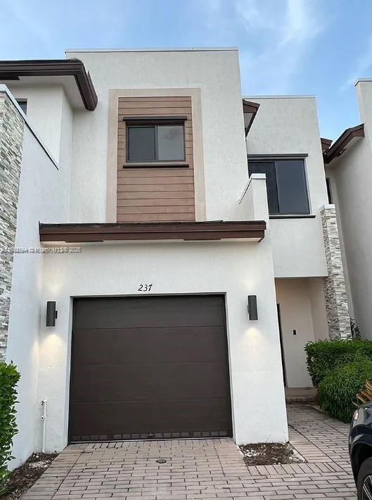 property at 237 NE 210th St