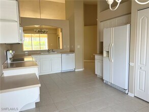 8103 Ibis Cove Cir in Naples, FL - Foto de edificio - Building Photo