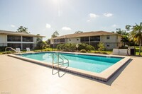 151 Cypress Way E, Unit A107 in Naples, FL - Building Photo - Building Photo